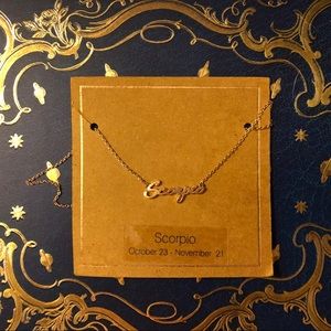 Francesca’s gold Scorpio necklace